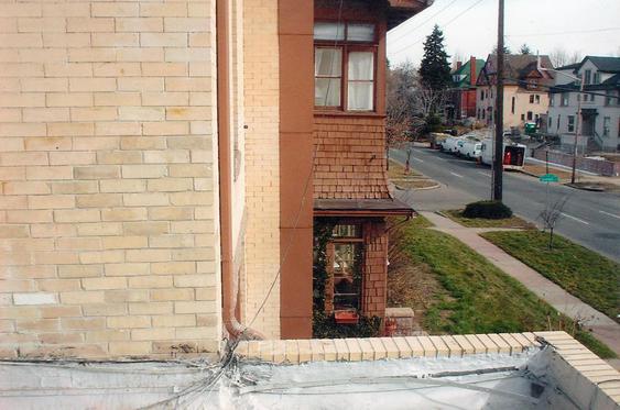 Eroding brick due to water damage, brick replacement to fix