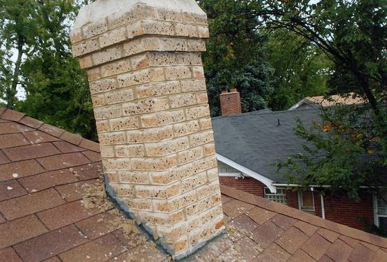 Grind Out All Mortar Joints, Tuck Point Chimney during_chimney_repointing_job_11_jpg