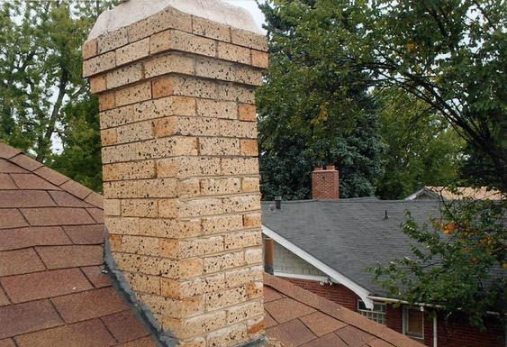 Grind Out All Mortar Joints, Tuck Point Chimney during_tuckpointing_on_chimney_in_denver_11_jpg