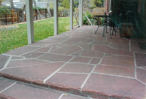Grind Out and Tuck Point Joints on Brick, Re-lay Some Stones