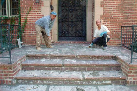 Grind Out and Tuck Point Joints on Brick, Re-lay Some Stones during_stone_tuck_pointing_on_porch_1_jpg