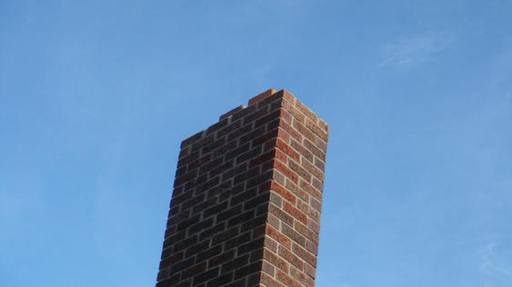 Grind Out And Tuck Point All Joints On Chimney