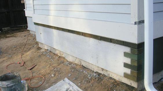 Installing Thin Brick on Back Addition of House during_1_33_jpg