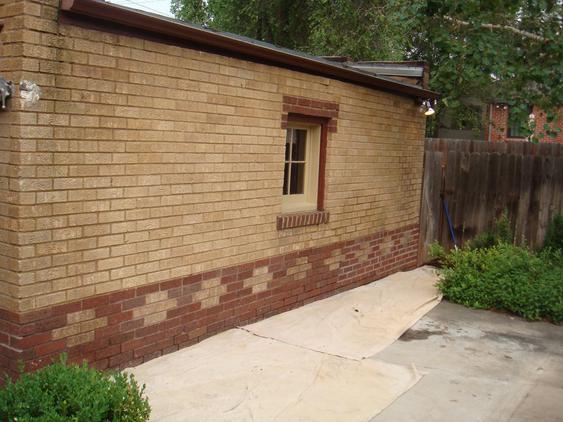 Rebuild Both Courses of Garage Wall to Plumb before_bowed_out_garage_wall_25_jpg
