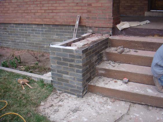 Rebuild Porch Wall, Re-lay Loose Bricks and Stone, Tuckpoint Deteriorating Mortar during_2_24_jpg