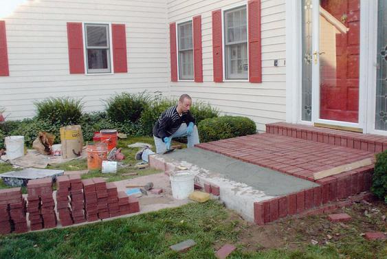 Add new pavers over concrete porch during_adding_brick_pavers_over_a_concrete_porch_4_jpg