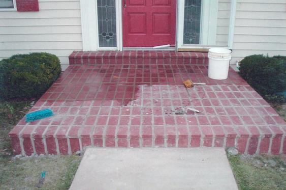 Add new pavers over concrete porch during_brick_tuckpointing_on_brick_pavers_4_jpg