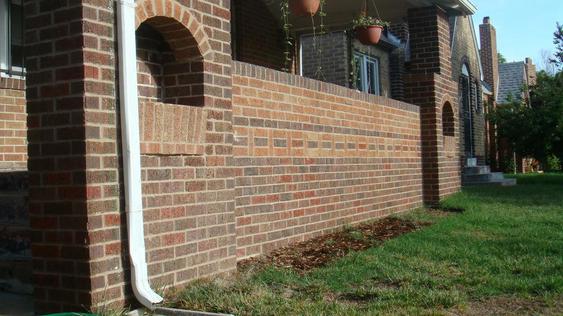 Grind Out And Tuck Point All Joints On Porch Wall And Replace Bad Bricks