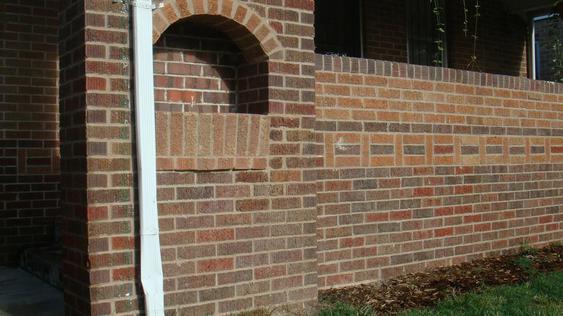 Grind Out And Tuck Point All Joints On Porch Wall And Replace Bad Bricks after_dsc00143_jpg