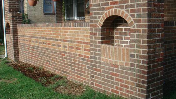 Grind Out And Tuck Point All Joints On Porch Wall And Replace Bad Bricks after_dsc00144_jpg