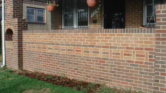 Grind Out And Tuck Point All Joints On Porch Wall And Replace Bad Bricks after_dsc00146_jpg