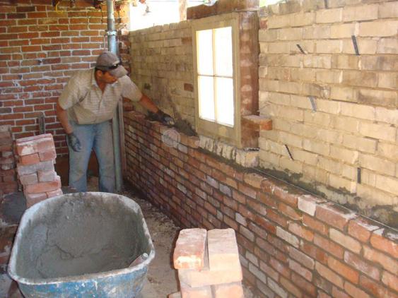 Rebuild Both Courses of Garage Wall to Plumb during_6_25_jpg