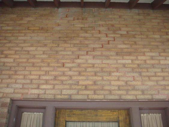 Rebuild Porch Wall, Re-lay Loose Bricks and Stone, Tuckpoint Deteriorating Mortar before_1_24_jpg