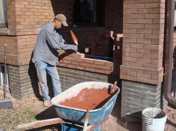 Rebuild Porch Wall, Re-lay Loose Bricks and Stone, Tuckpoint Deteriorating Mortar during_5_24_jpg